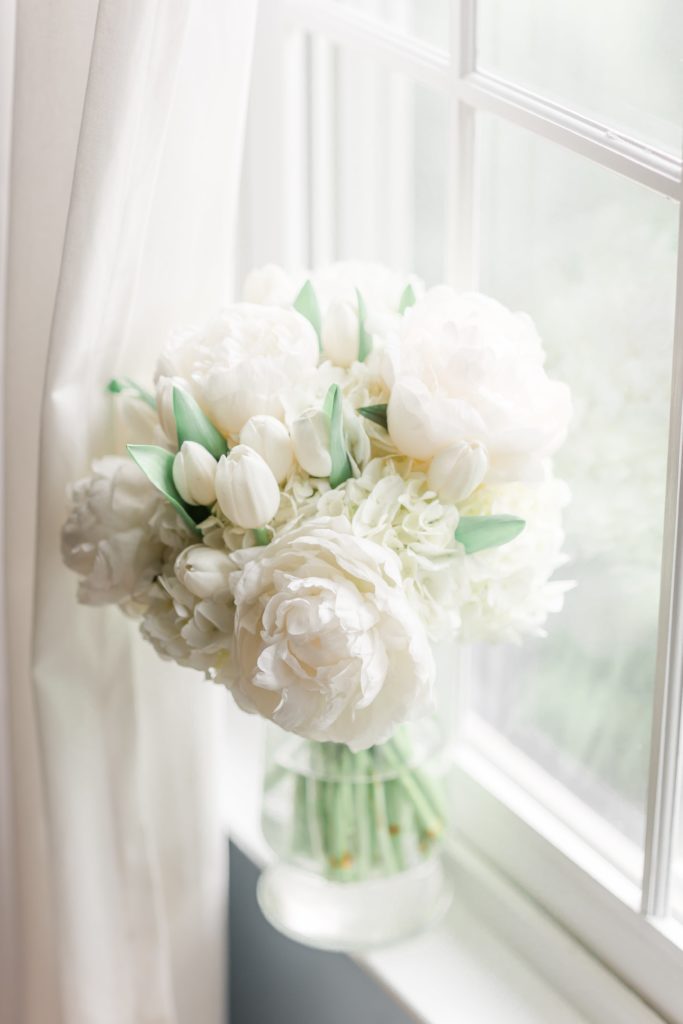 White wedding bouquet with peonies and tulips