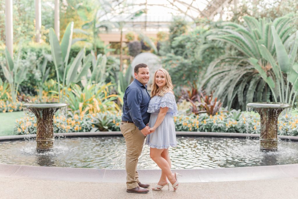 Longwood Gardens engagement photos in front of waterfall