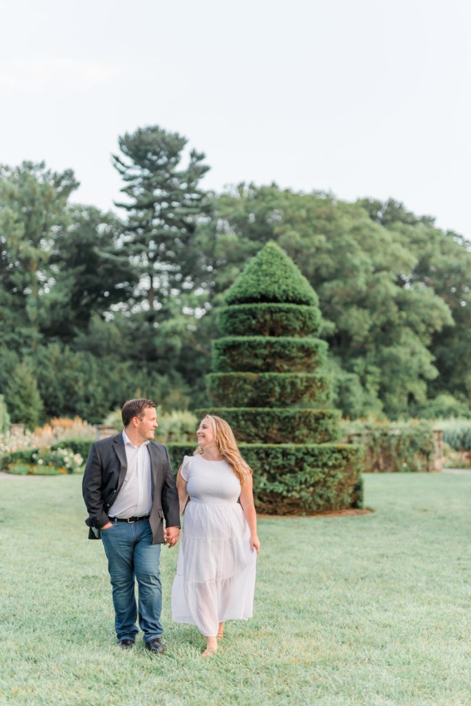 Engaged couple during garden engagement session
