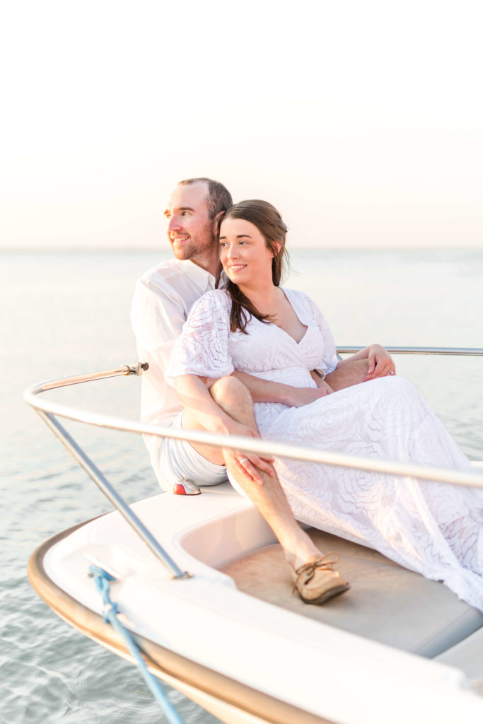 Sunset engagement photos on a boat
