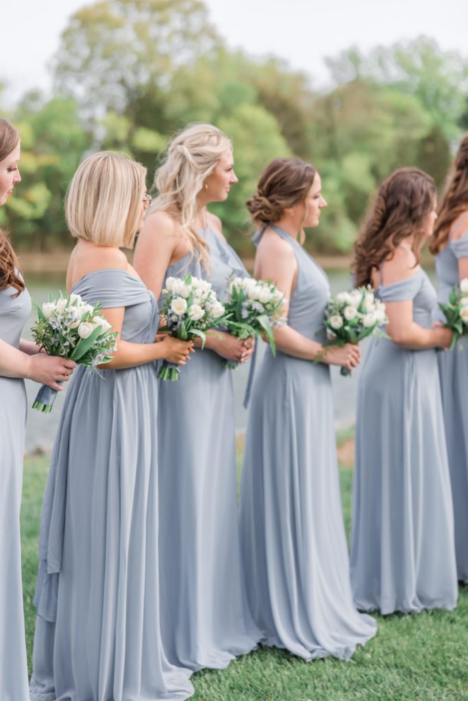 Bridesmaids in dusty blue long dresses