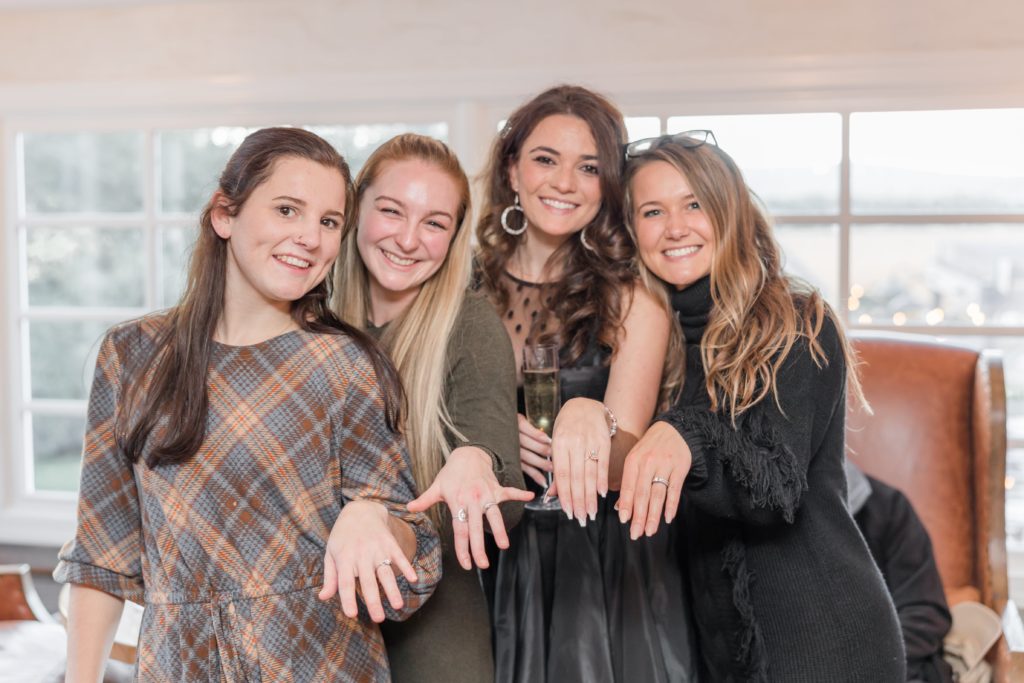Girls showing engagement rings