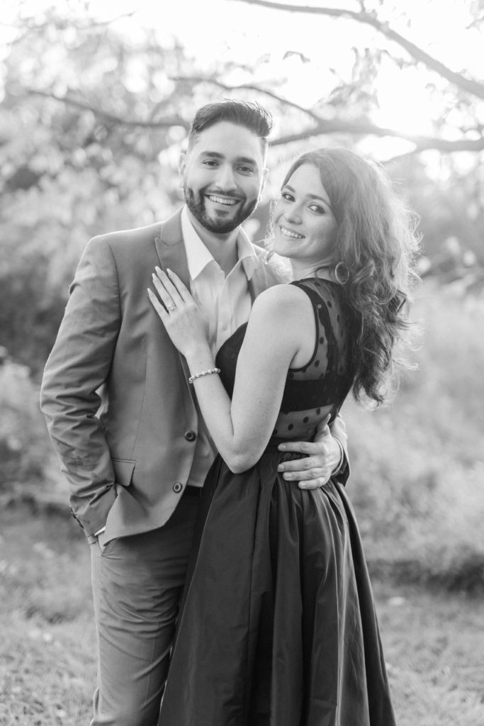 Black and white engagement portrait of couple