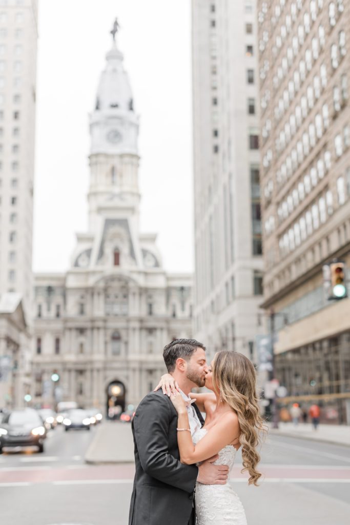 Bride and groom kissing in Philadelphia City Hall Wedding Portraits
