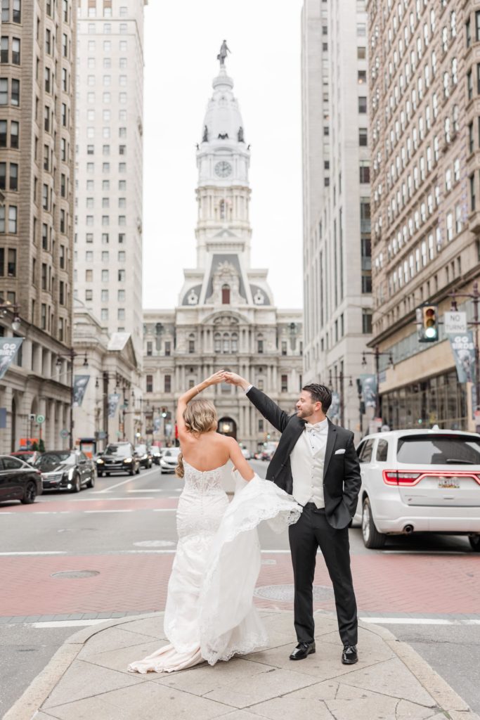 Bride and Groom dancing in Philadelphia City Hall Wedding Portraits