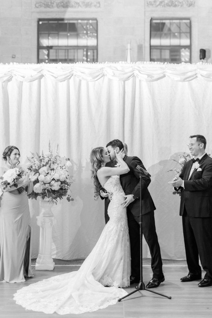 Bride and groom kissing at Union Trust wedding ceremony