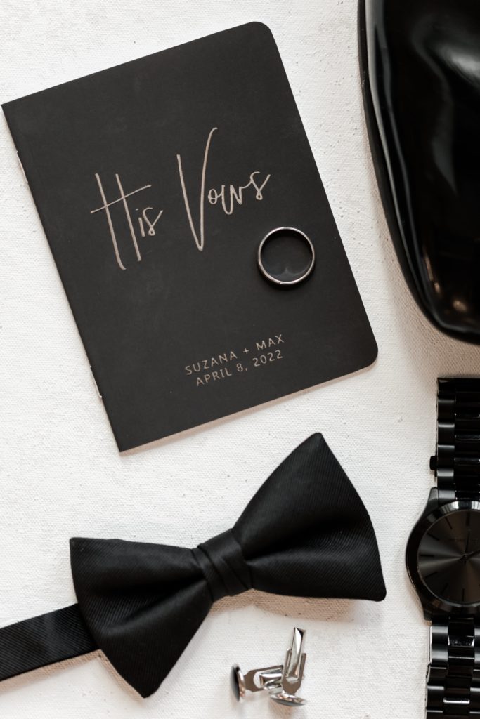 Black vow book and bowtie