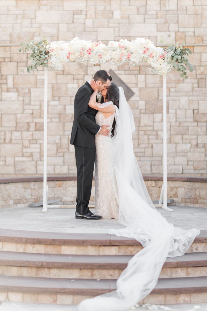 New Jersey bride and groom kissing at wedding ceremony