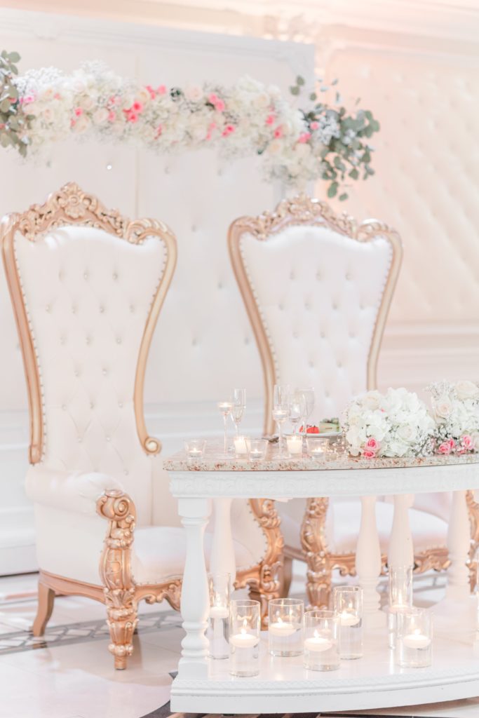 Sweet heart table with white and gold chairs