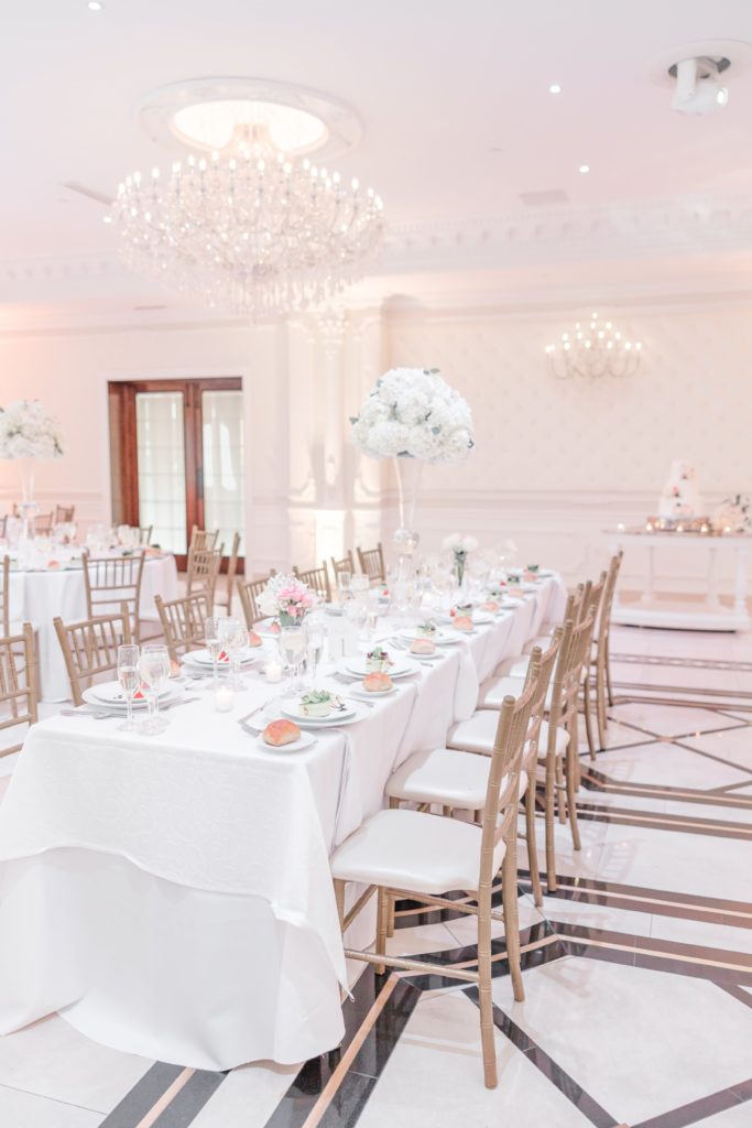 White and gold wedding reception decor at The Grand hotel
