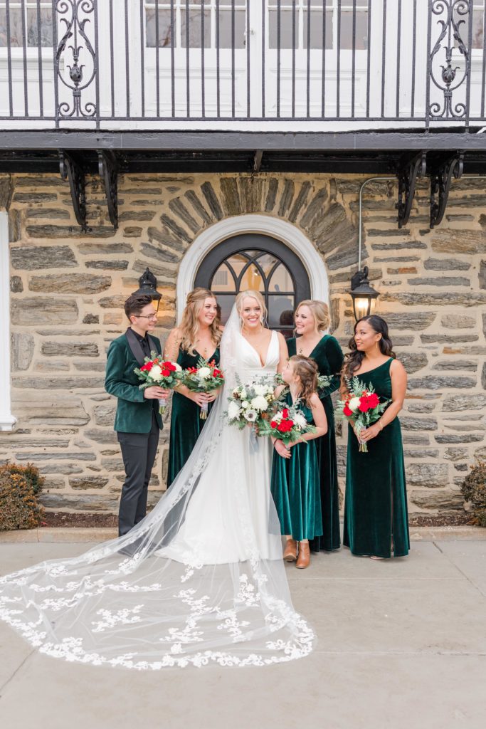 Bride with bridesmaids in velvet dresses