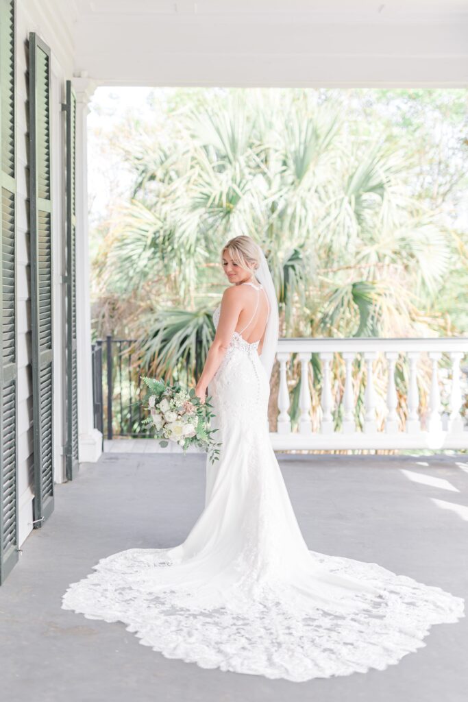 Bride in lace backless wedding dress