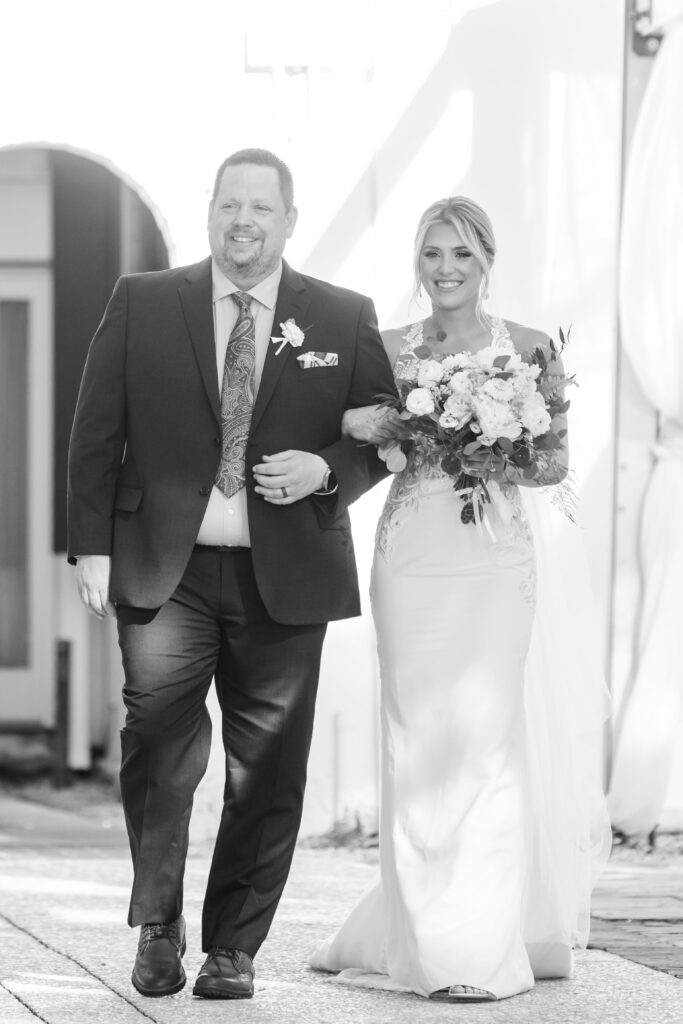 Black and white photo of bride and father