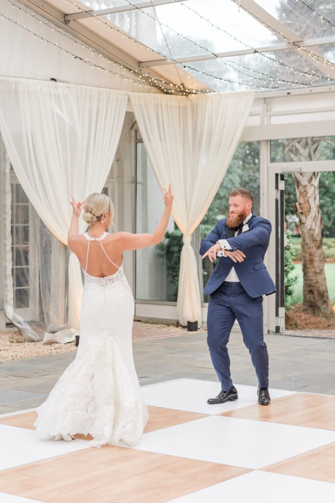 Bride and groom first dance at tented wedding