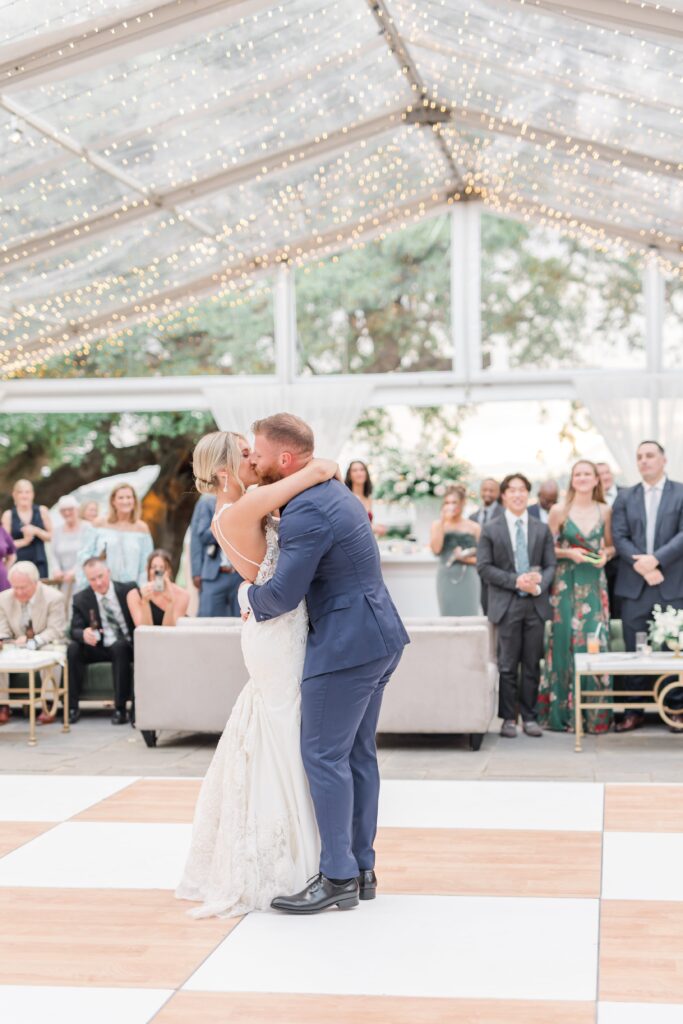 Bride and groom first dance at tented wedding