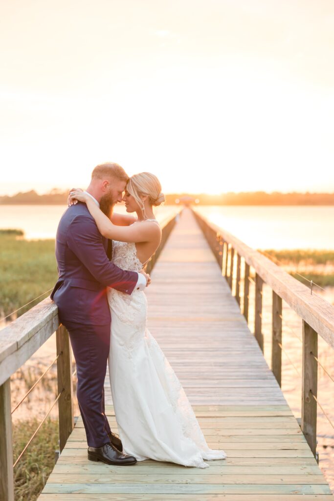 Bride and groom sunset photos at Lowndes Grove wedding