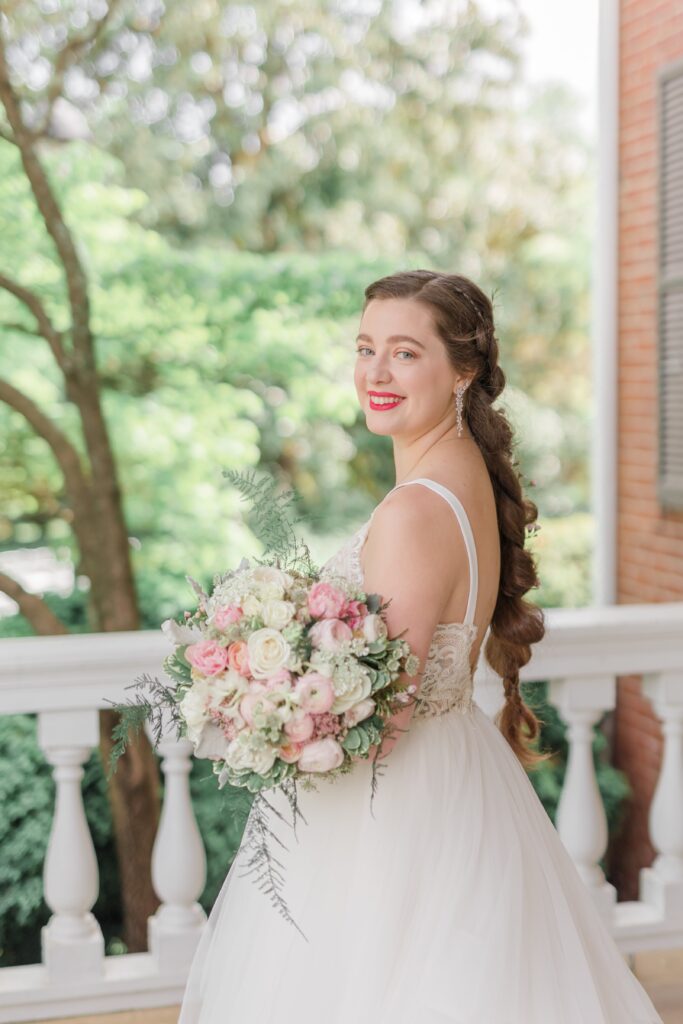 Bride with pink and white bouquet